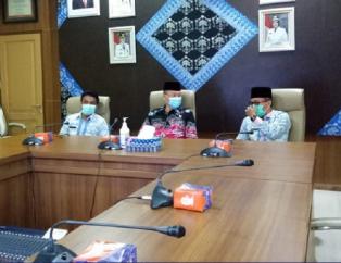 Asisten II Ikuti Rakor dan Bimtek Komisi Informasi Bersama PPID Prov. Sumatera Selatan Via Virtual